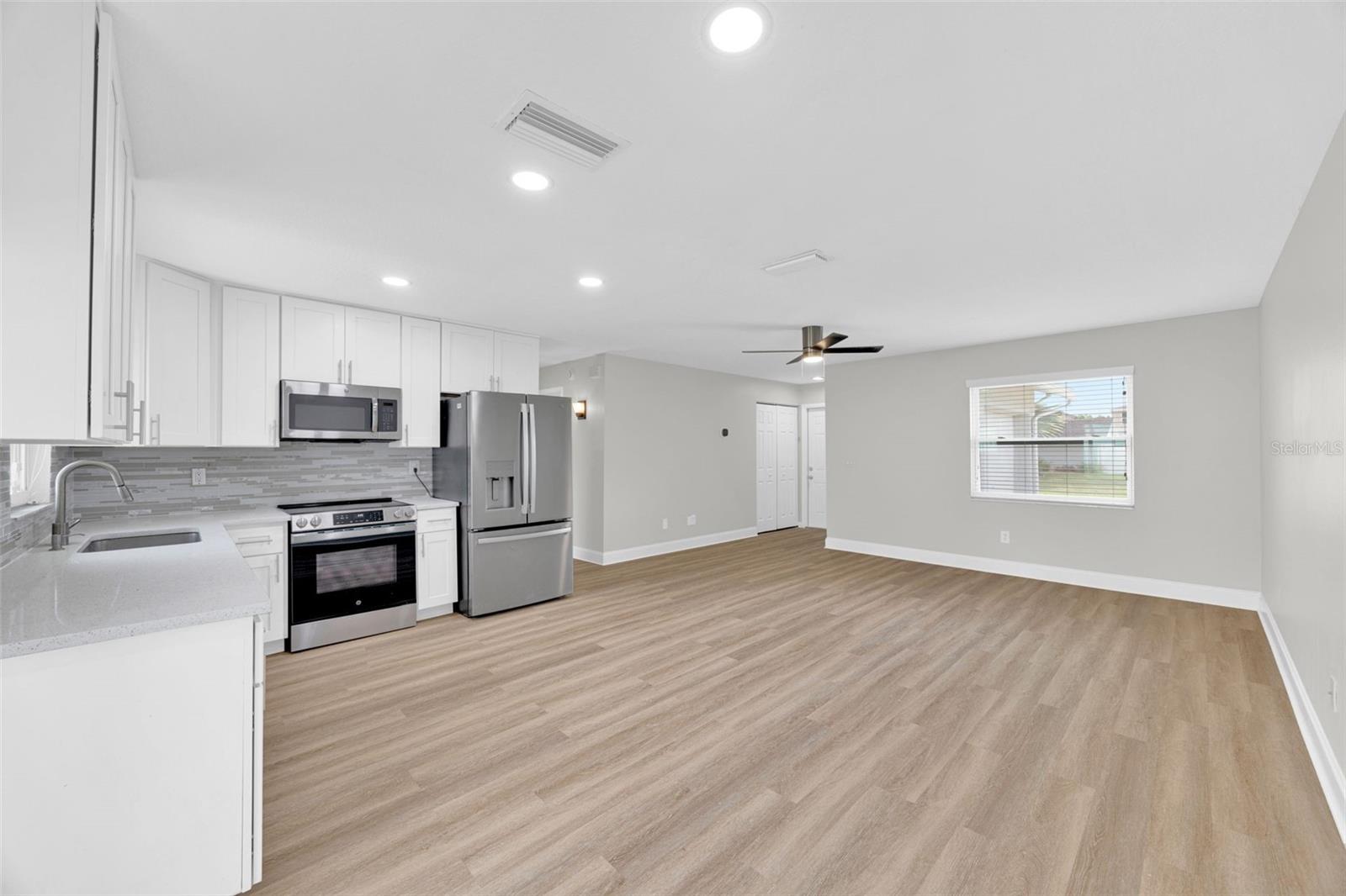 KITCHEN TO LIVING FROM DINING AREA
