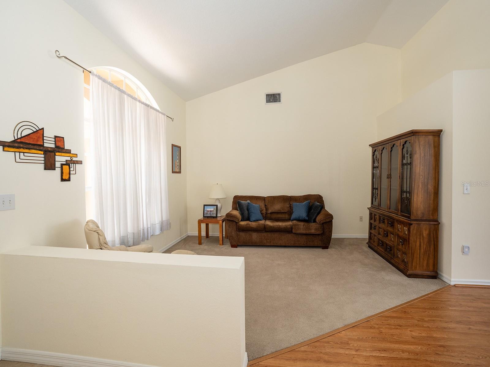 Formal Living room includes Vintage China, sofa, chair, table and lamp