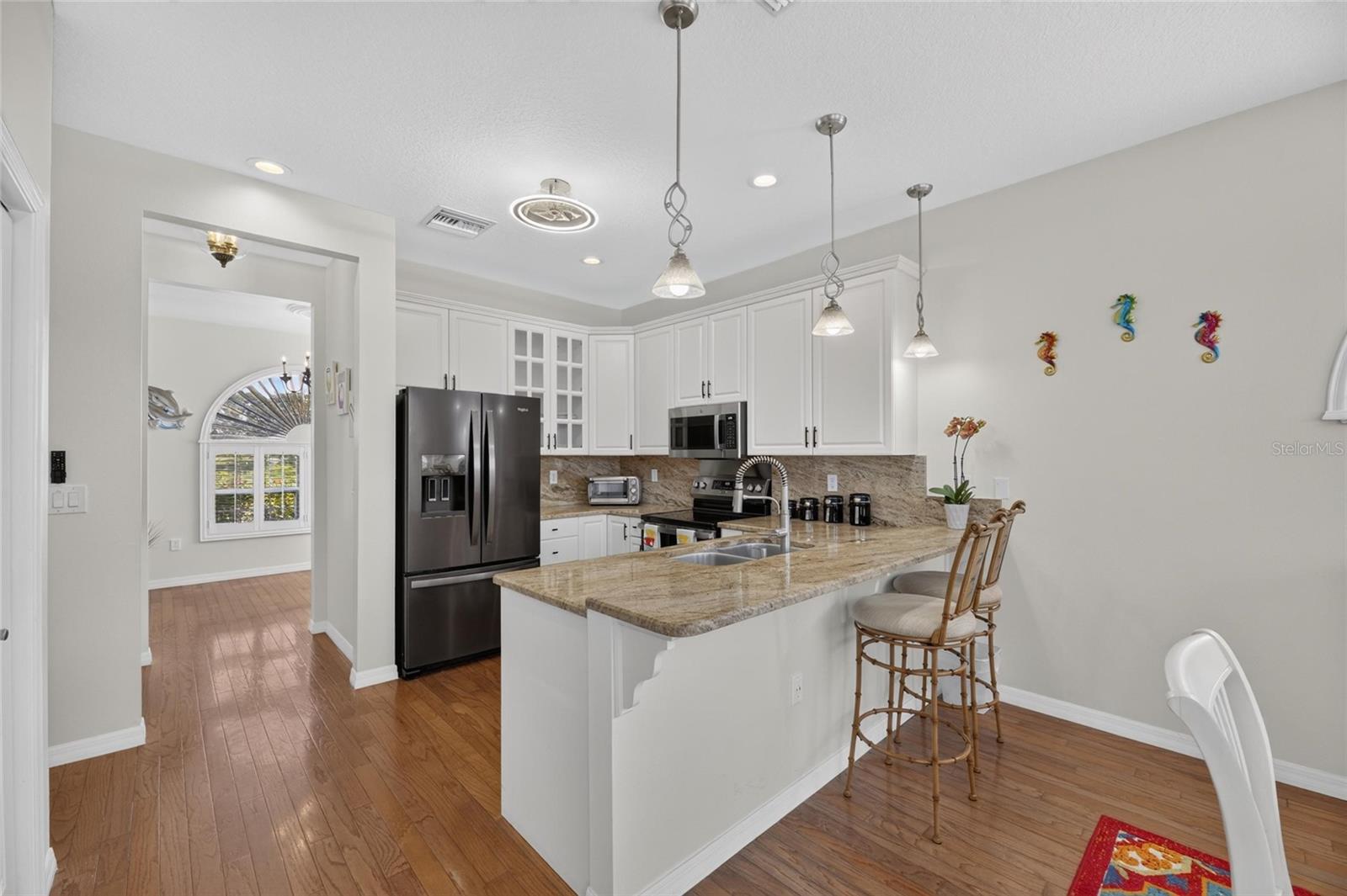 42" White Cabinetry - Newer Stainless-Steel Appliances