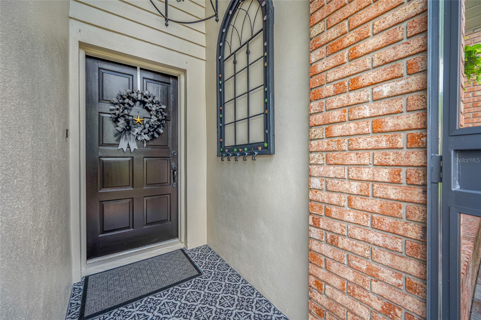 Screened entry with new tile flooring