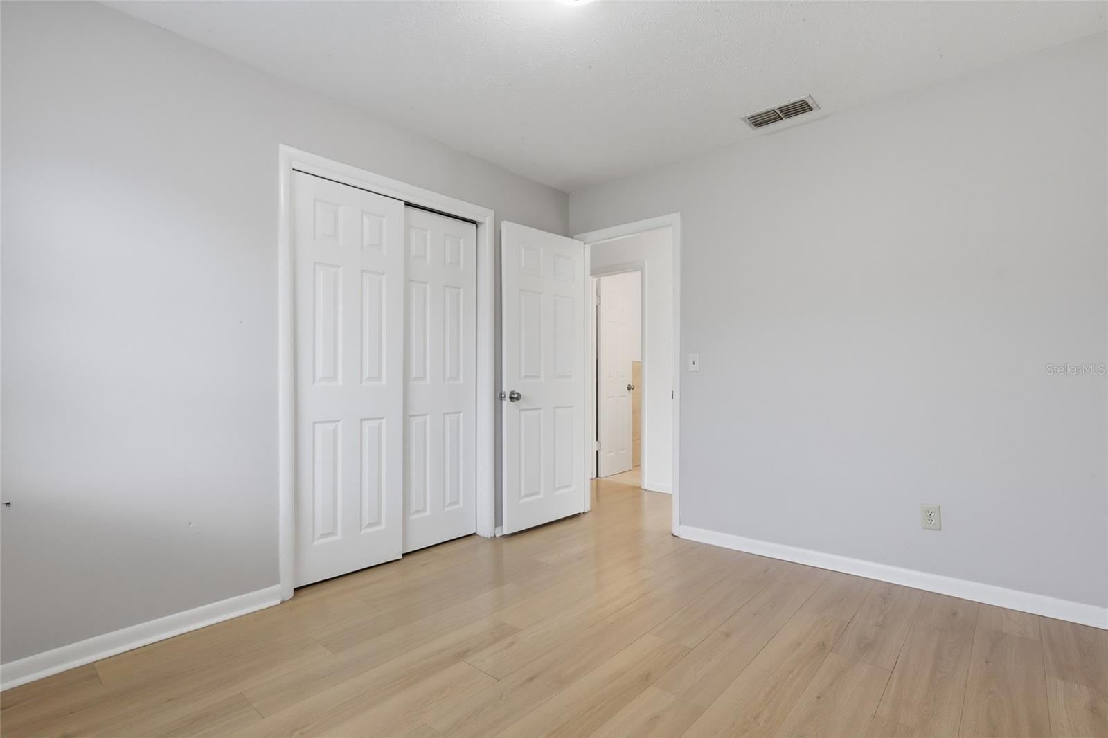 Other side of first bedroom.