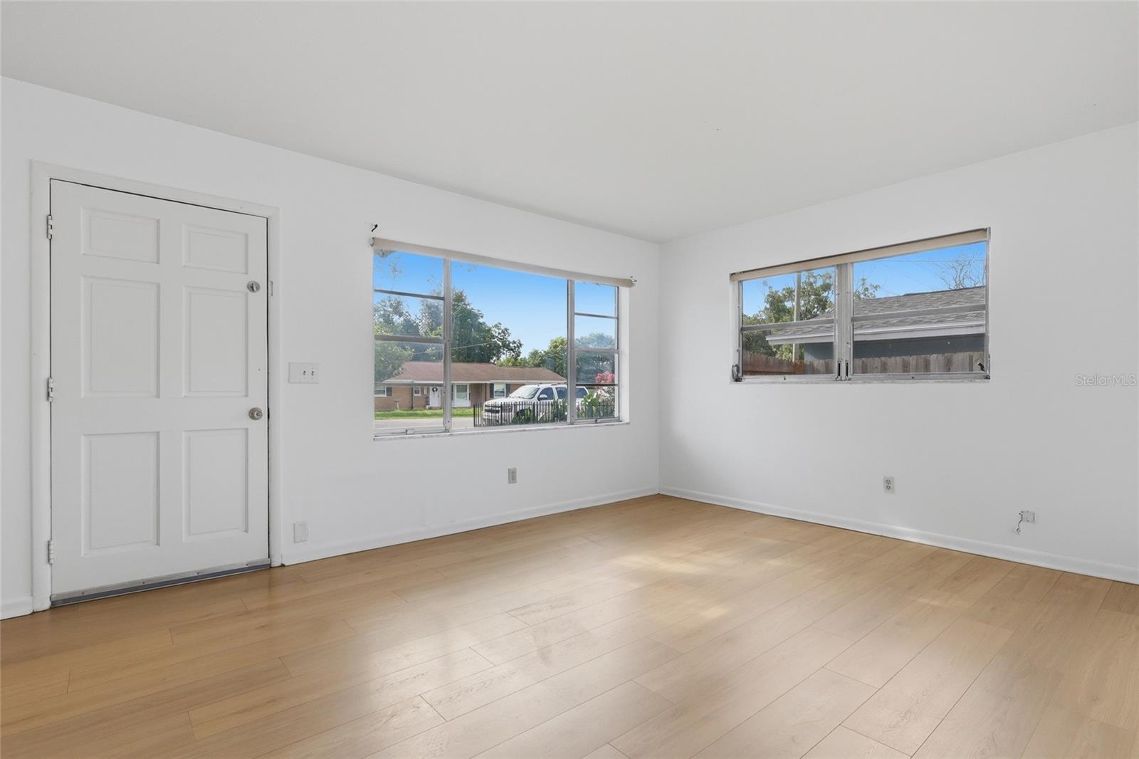 Enter into this light and bright living room.