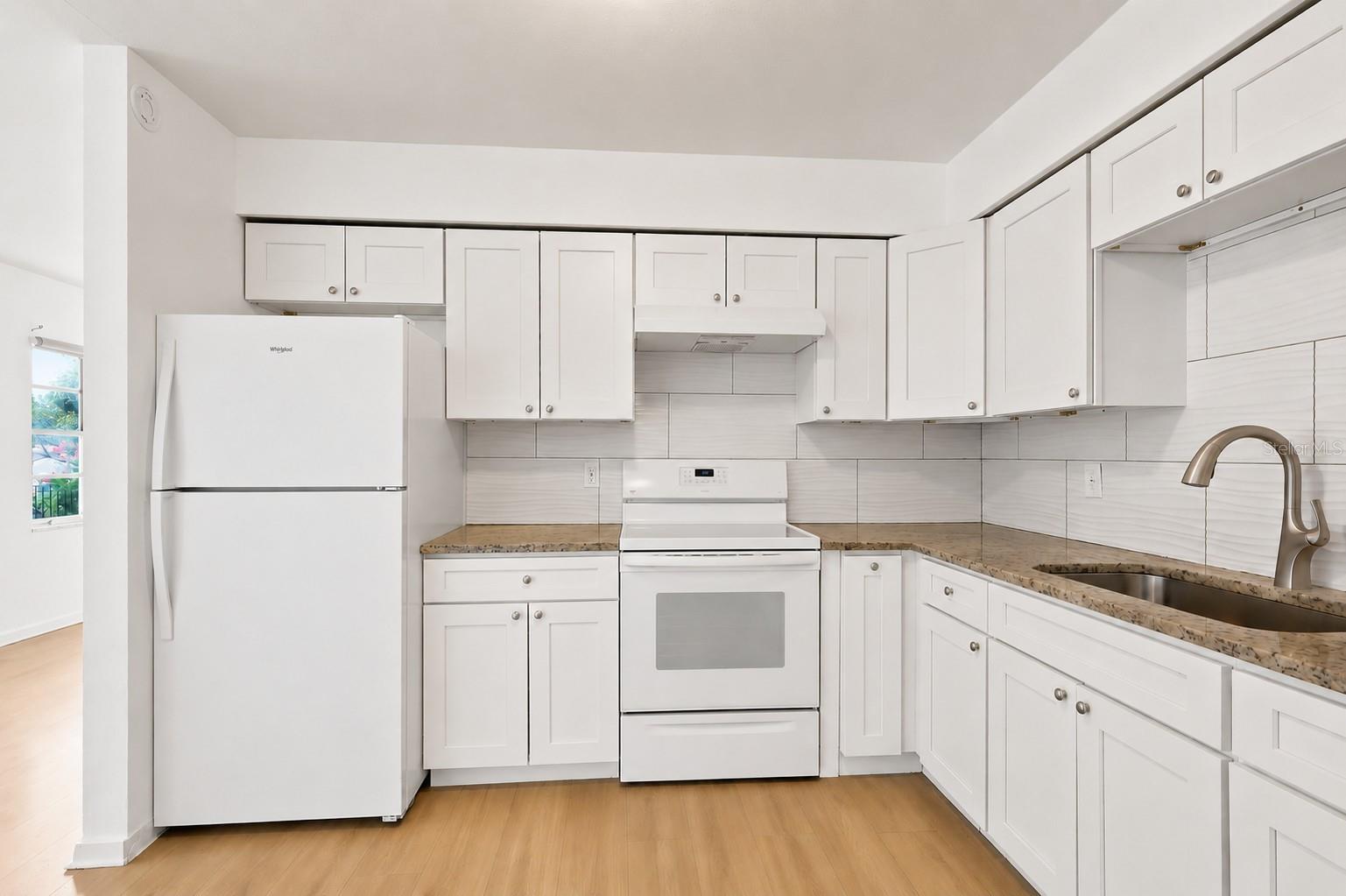 New refrigerator and stove.