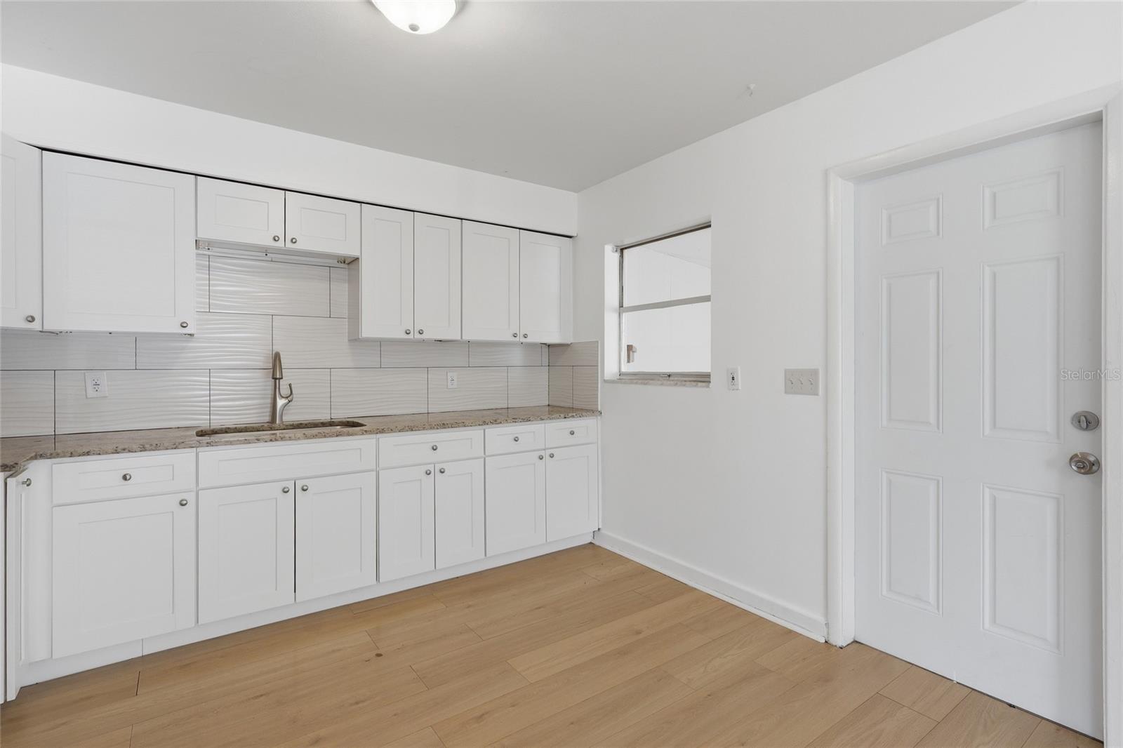 The door leads to the family/bonus room.