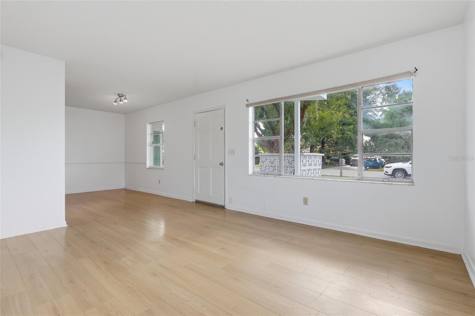 Living room open to the dinette area.
