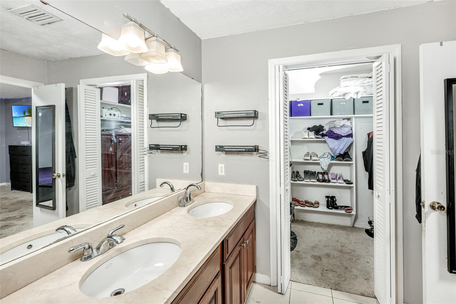 Primary en-suite with walk-in closet