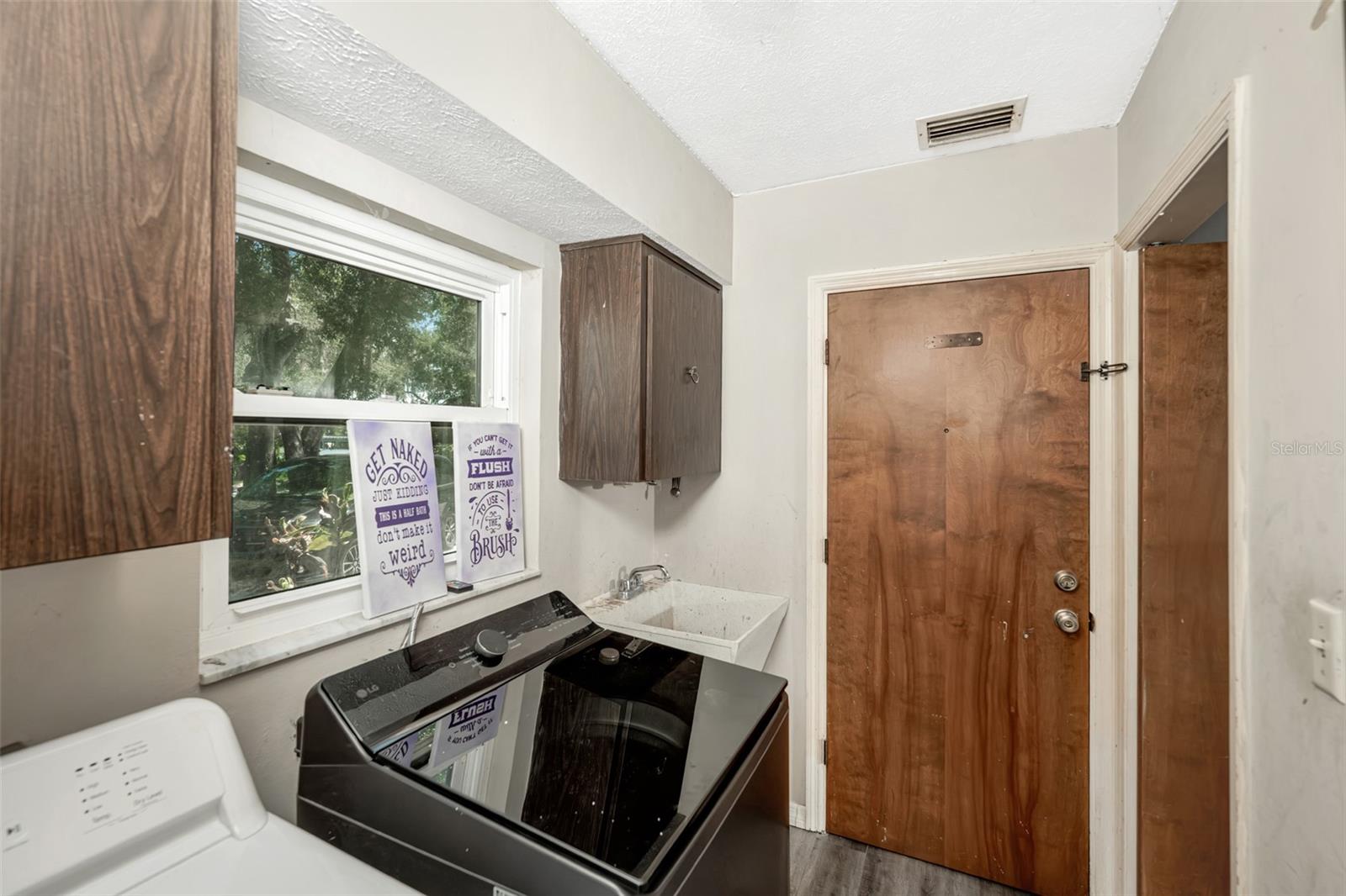 Laundry room leads to garage
