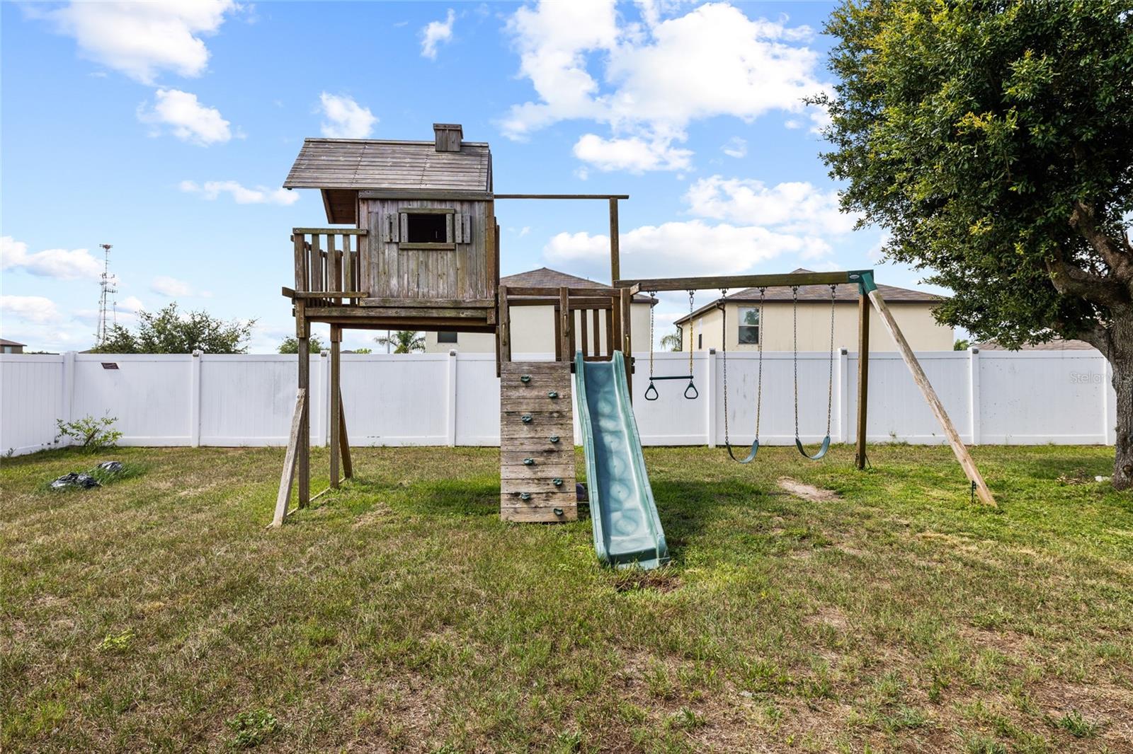 Private backyard play area offering ample space for recreation and outdoor enjoyment.