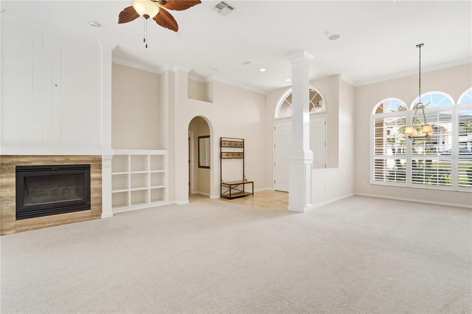 Family room w/ sidling glass doors accross