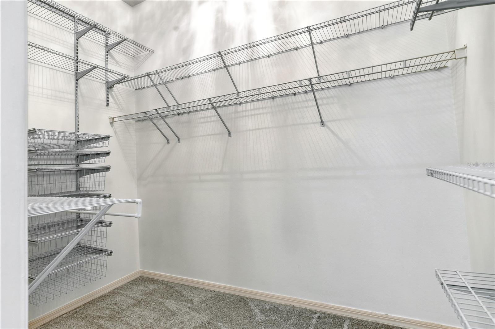 primary bedroom walk-in closet