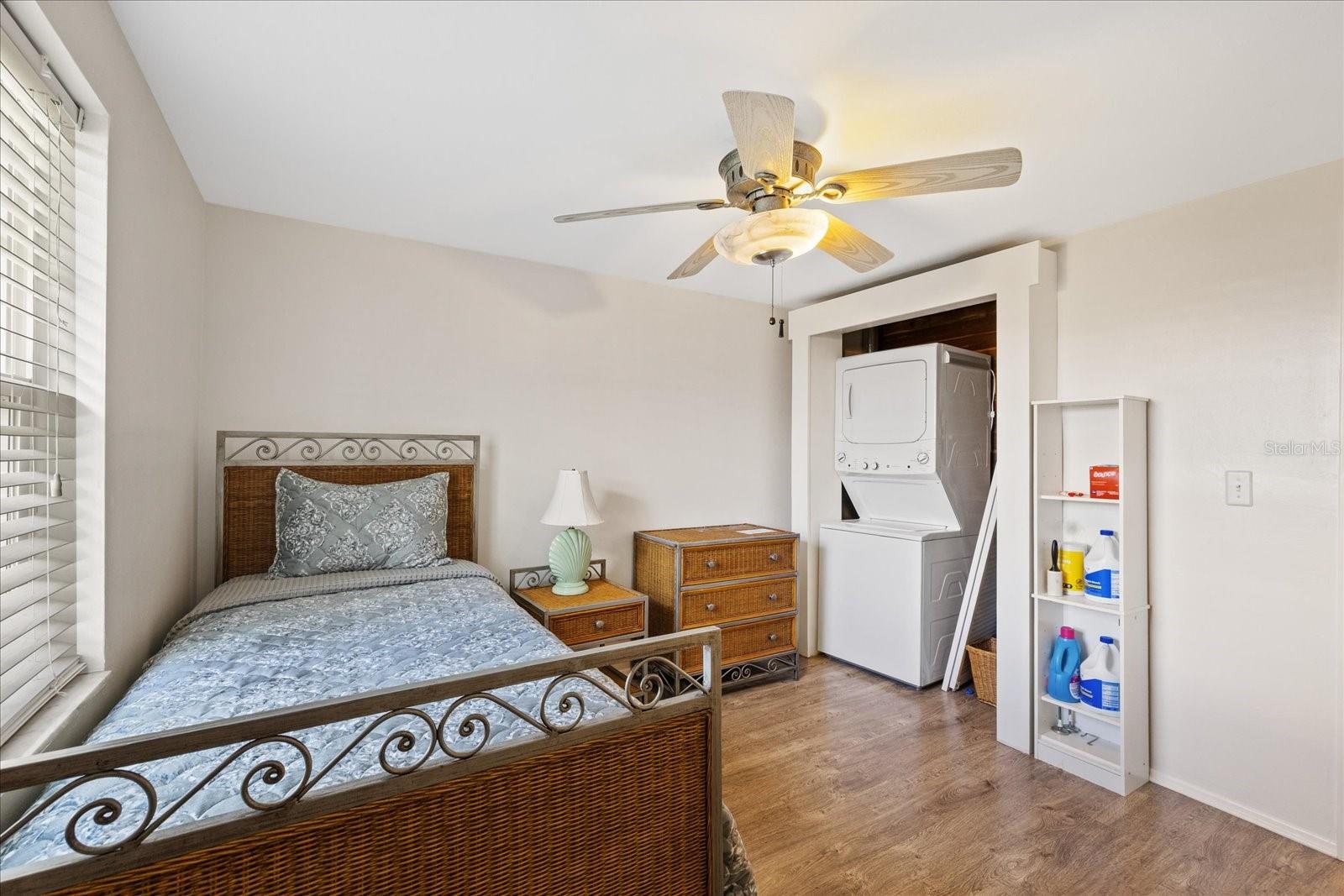 Bedroom 1 with laundry in closet