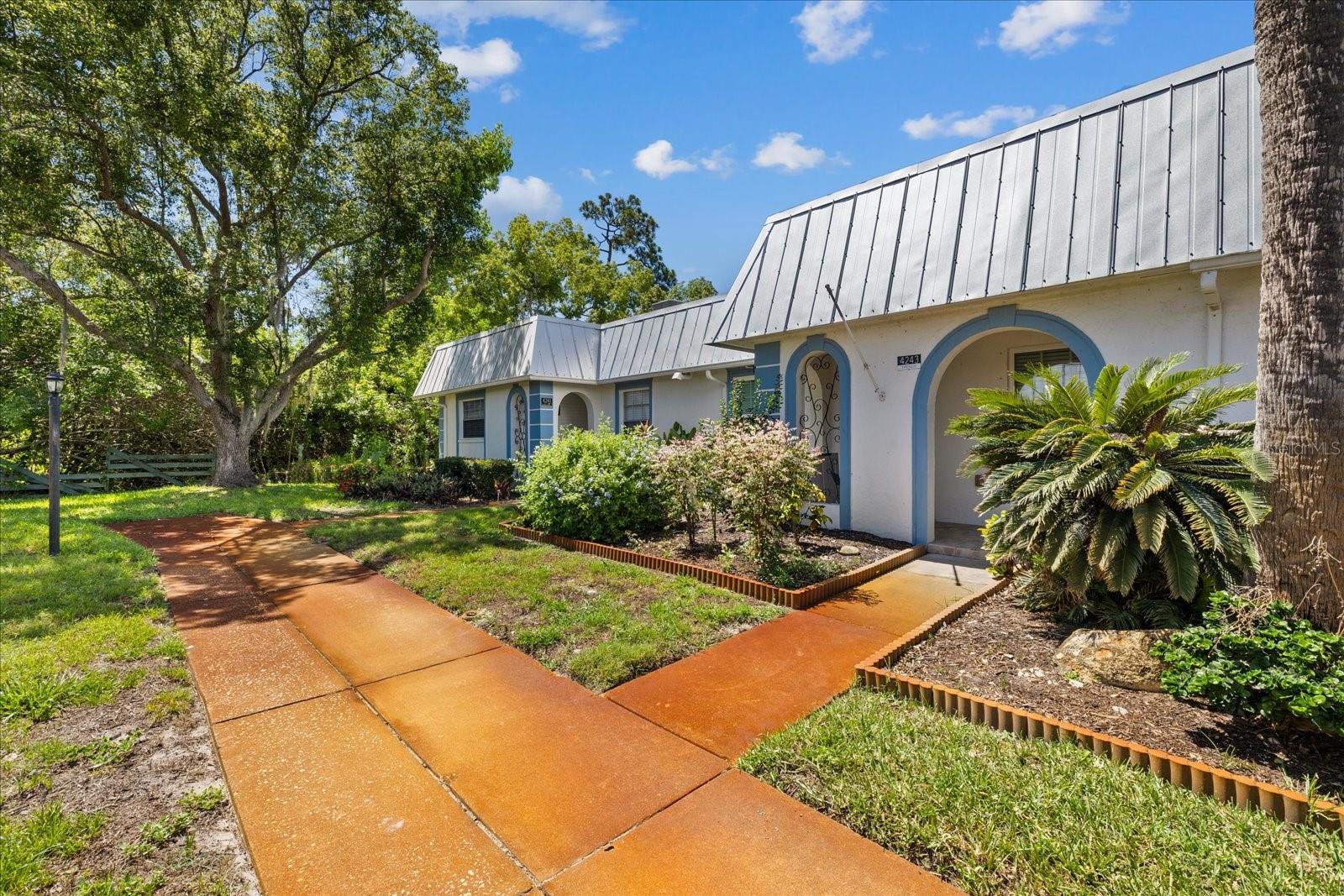 view from carport to condo entry
