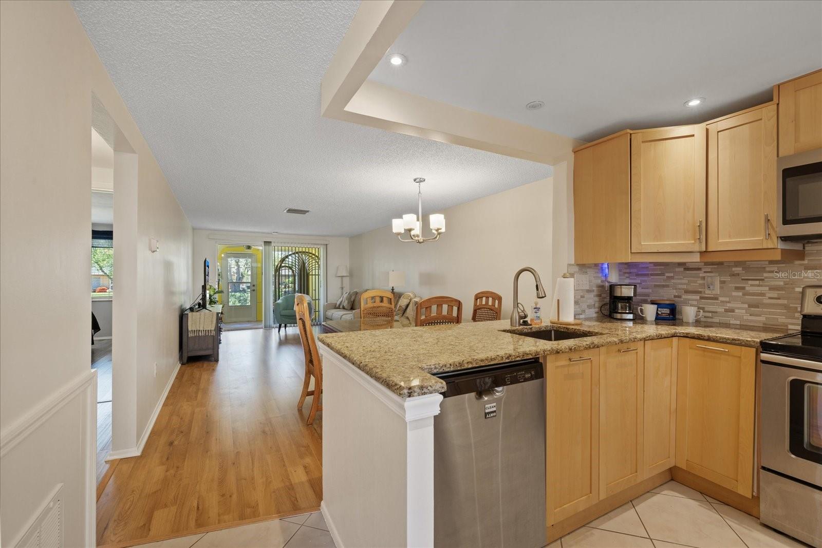 View from entry of kitchen, living room and lanai