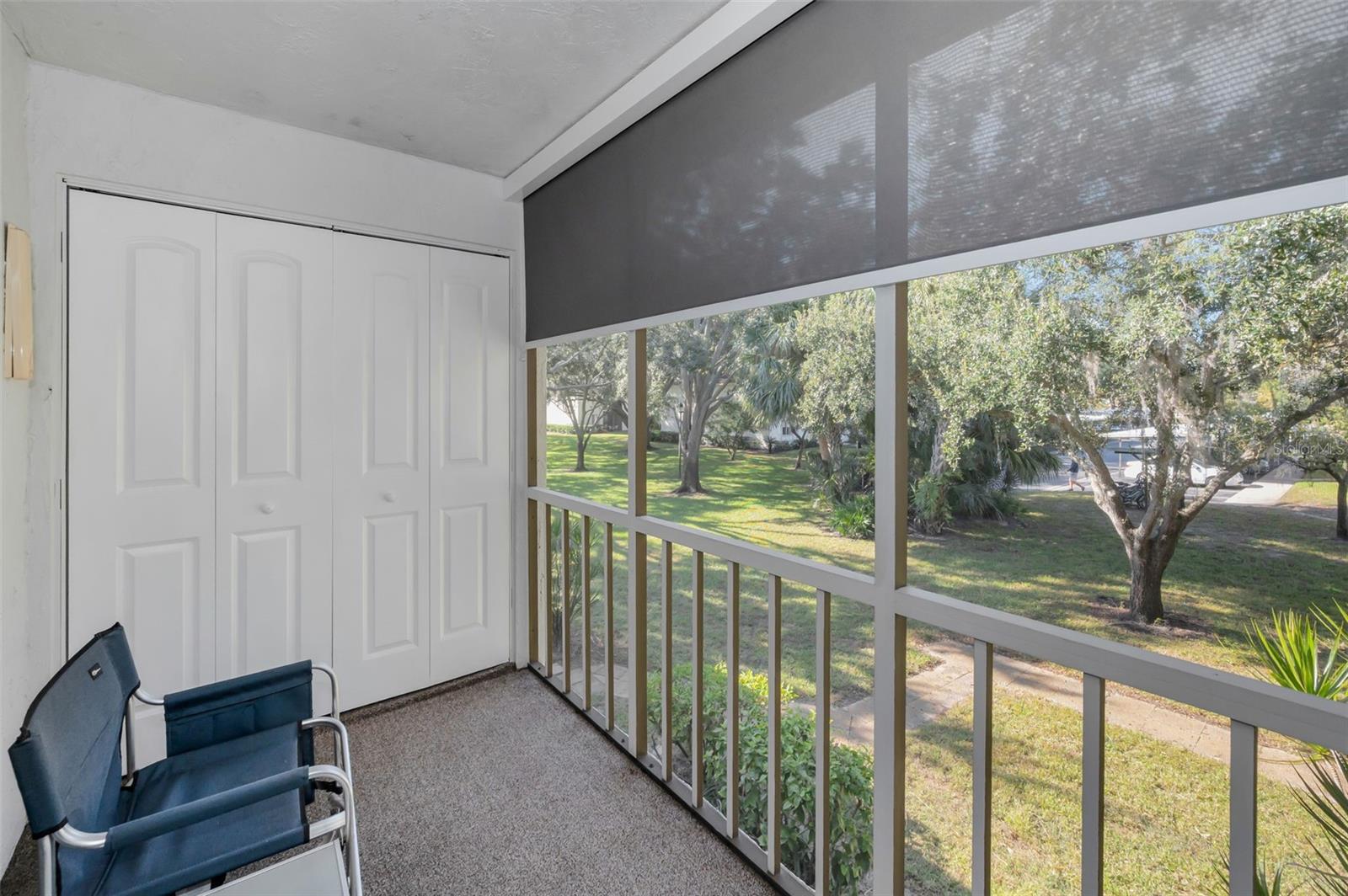Balcony with view of Greenspace- Laundry Closet with Washer/Dryer