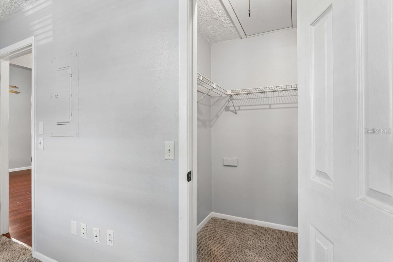 Guest bedroom has the walk-in closet with attic access.