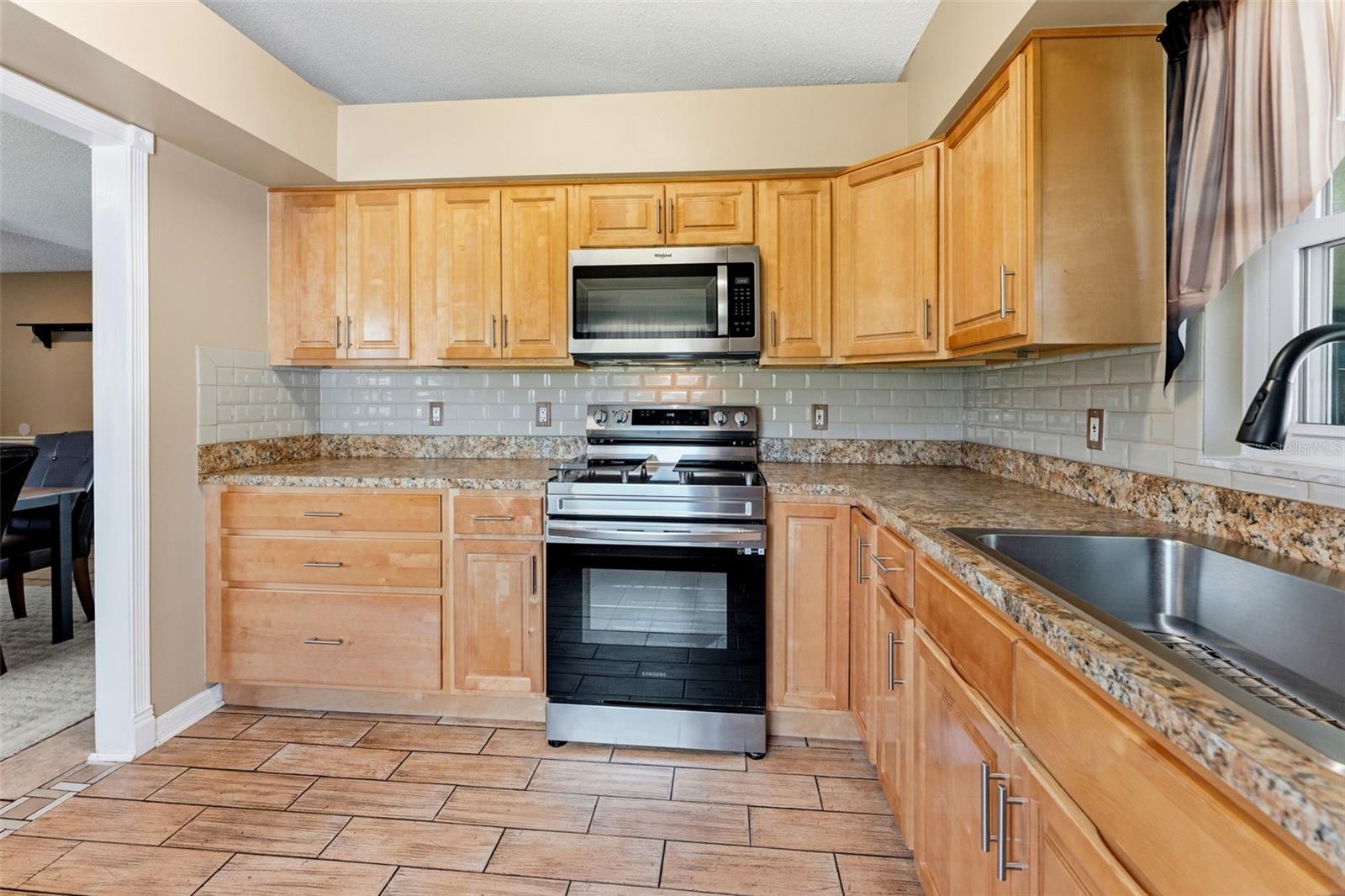 Kitchen with Stainless Steel Appliances and large Sink