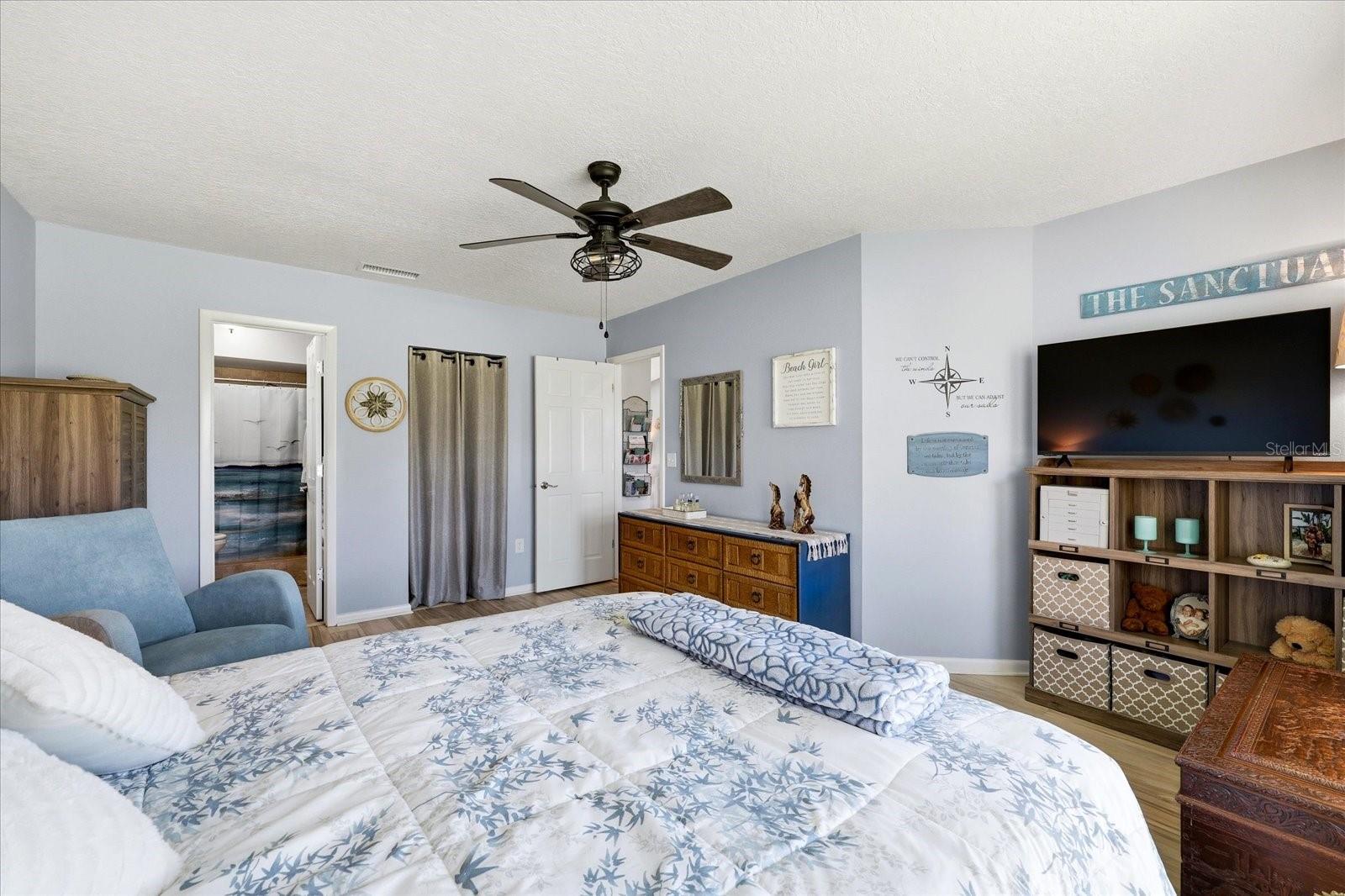 Primary bedroom with walk in closet.