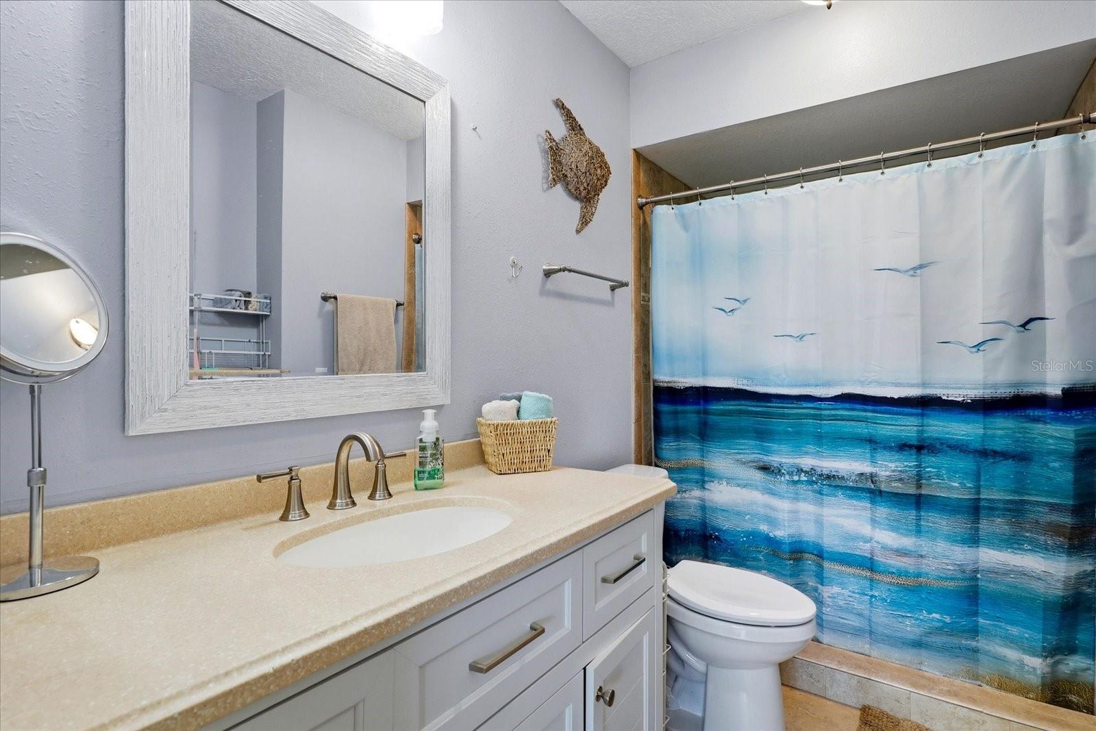 Primary bathroom with shower.