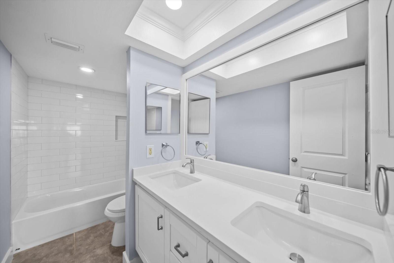 Primary Bedroom Bathroom, dual vanity, tub, all new