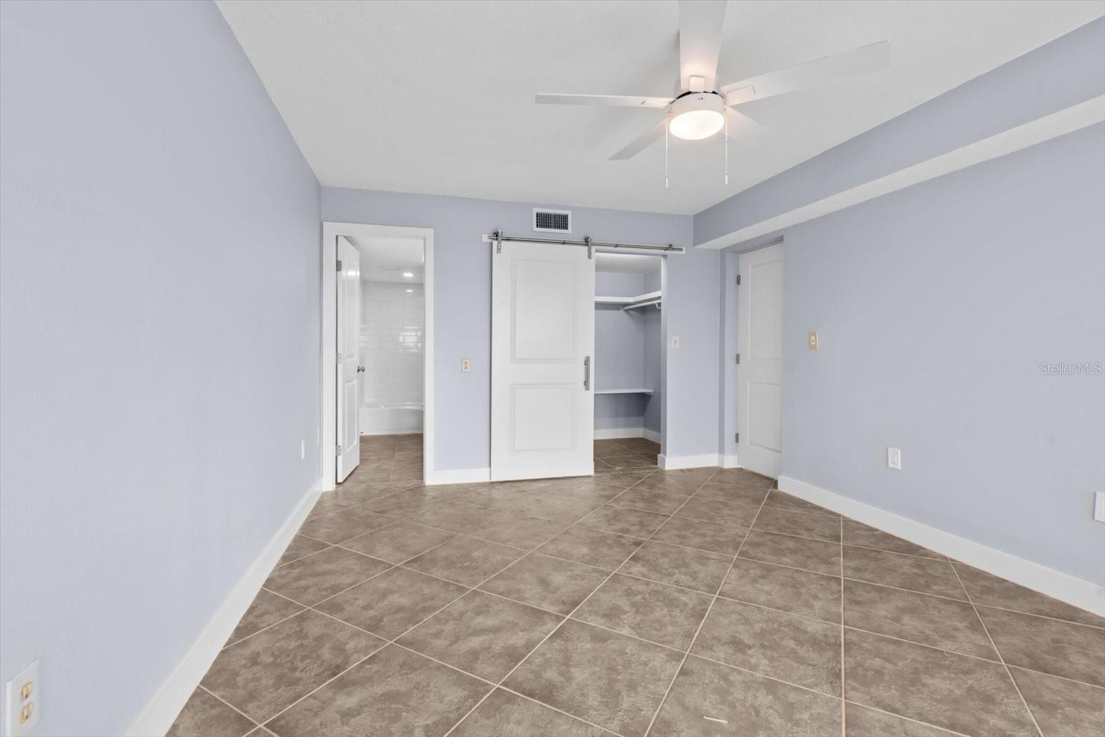 View of the En-suite bathroom and walk in closet, primary bedroom