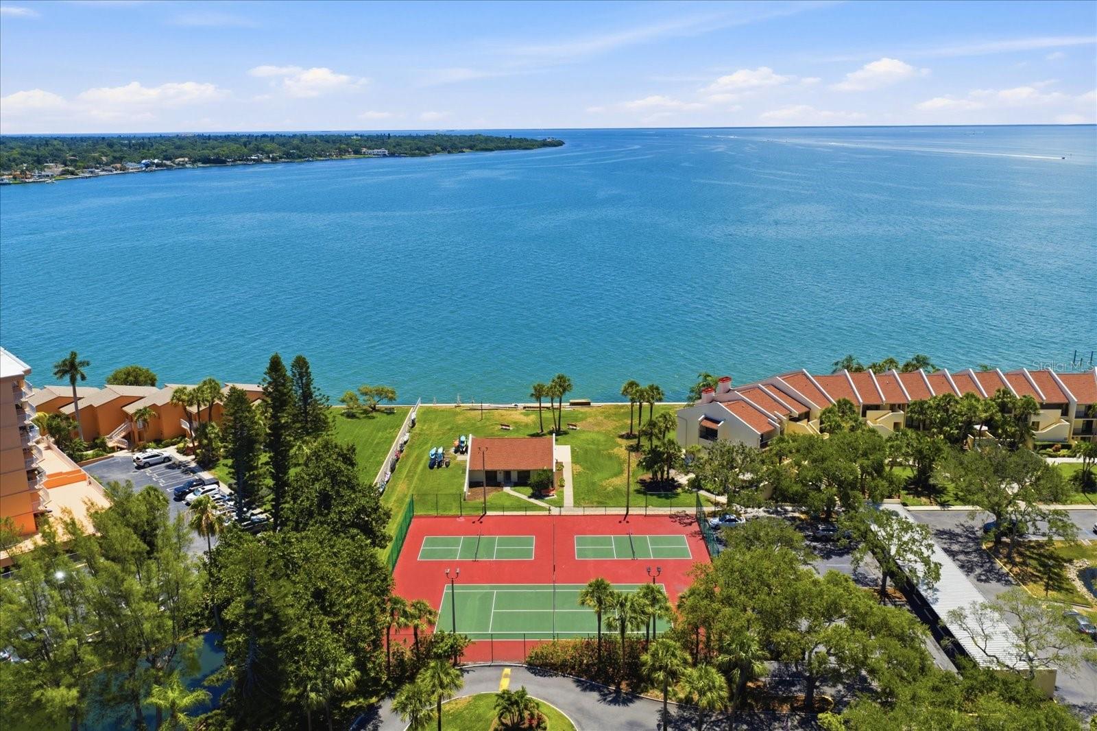 Pickle ball, tennis, club house, and kayak storage