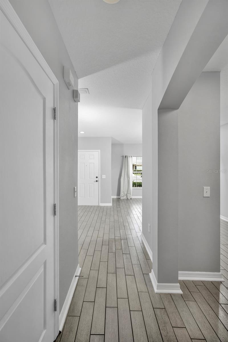 Front entrance with 1/2 bathroom door