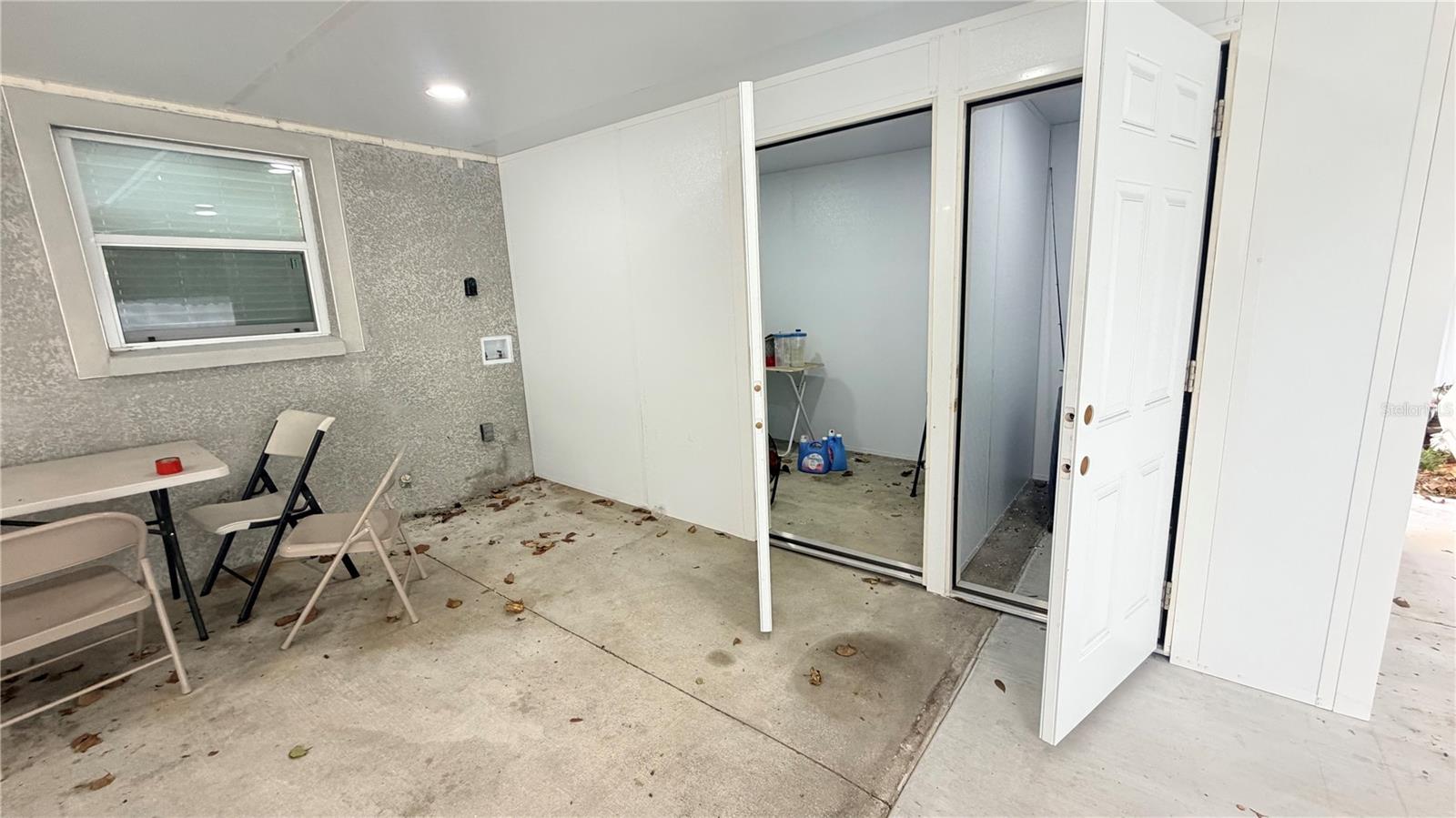 Laundry room and storage room/unfinished bathroom