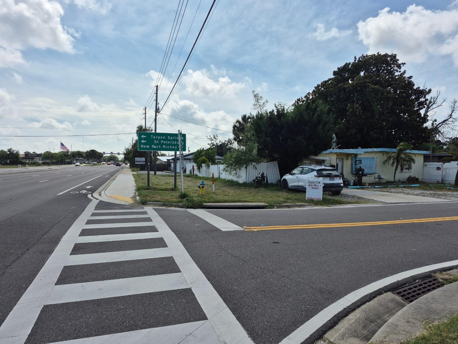 Facing West across Flamingo Drive on North side of SR 54, property to the right.