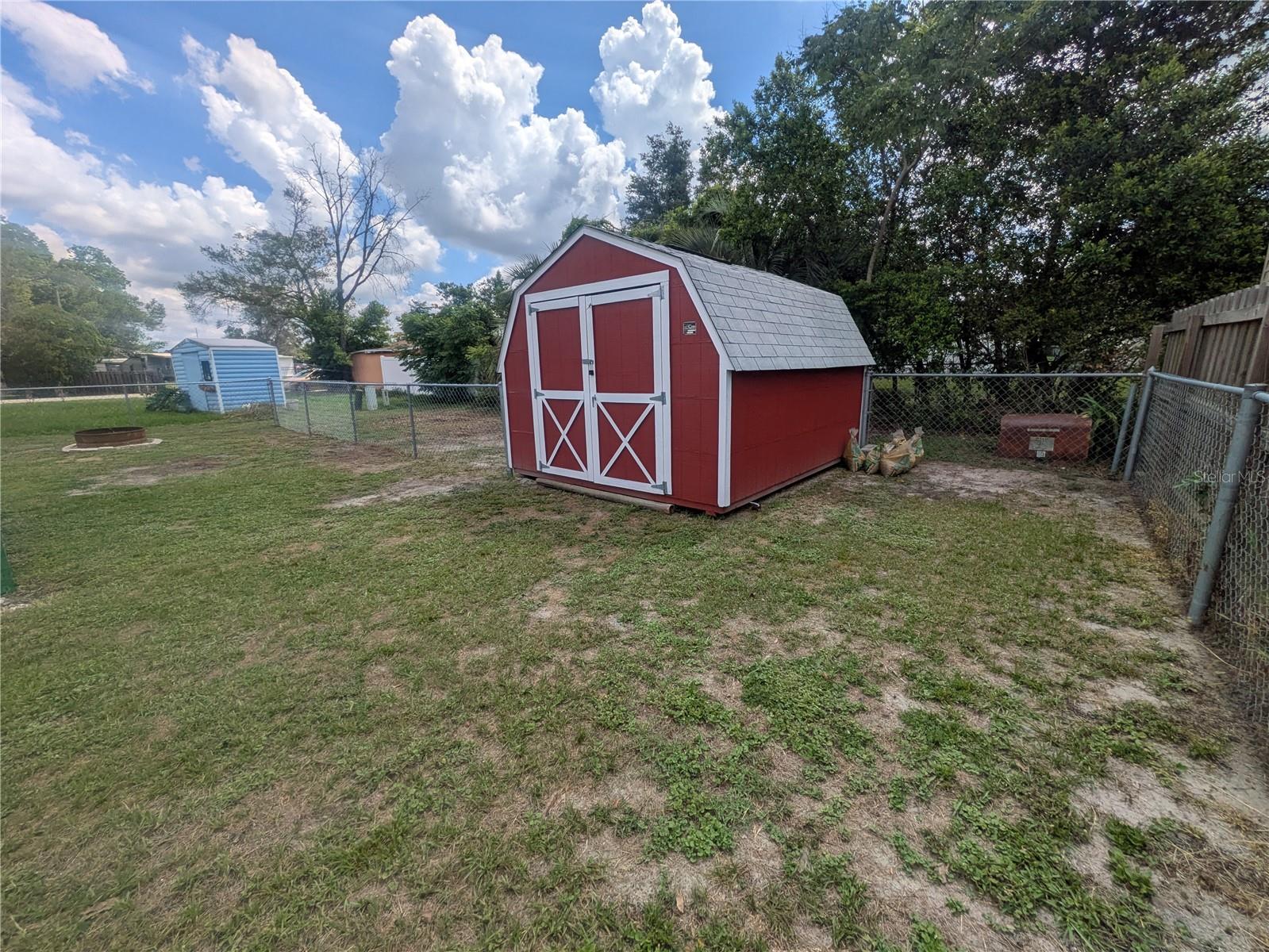 Open Yard with Barn style Shed