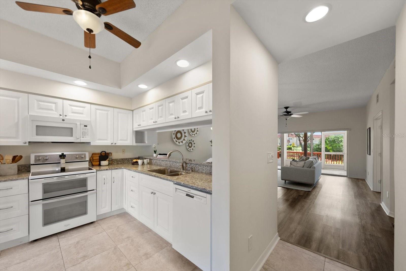 KITCHEN W/VIEW OF LIVING ROOM