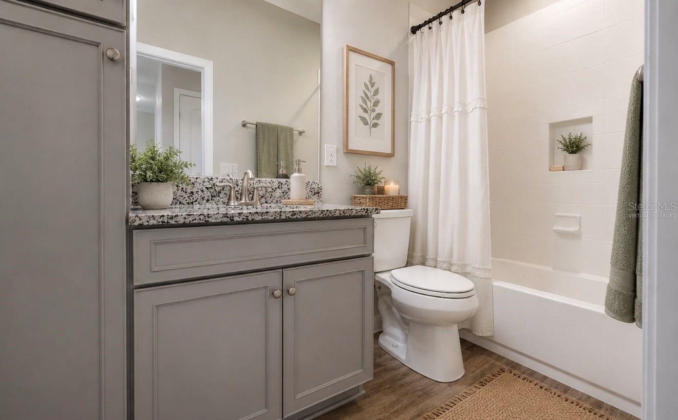 Virtually staged-upstairs guest bathroom