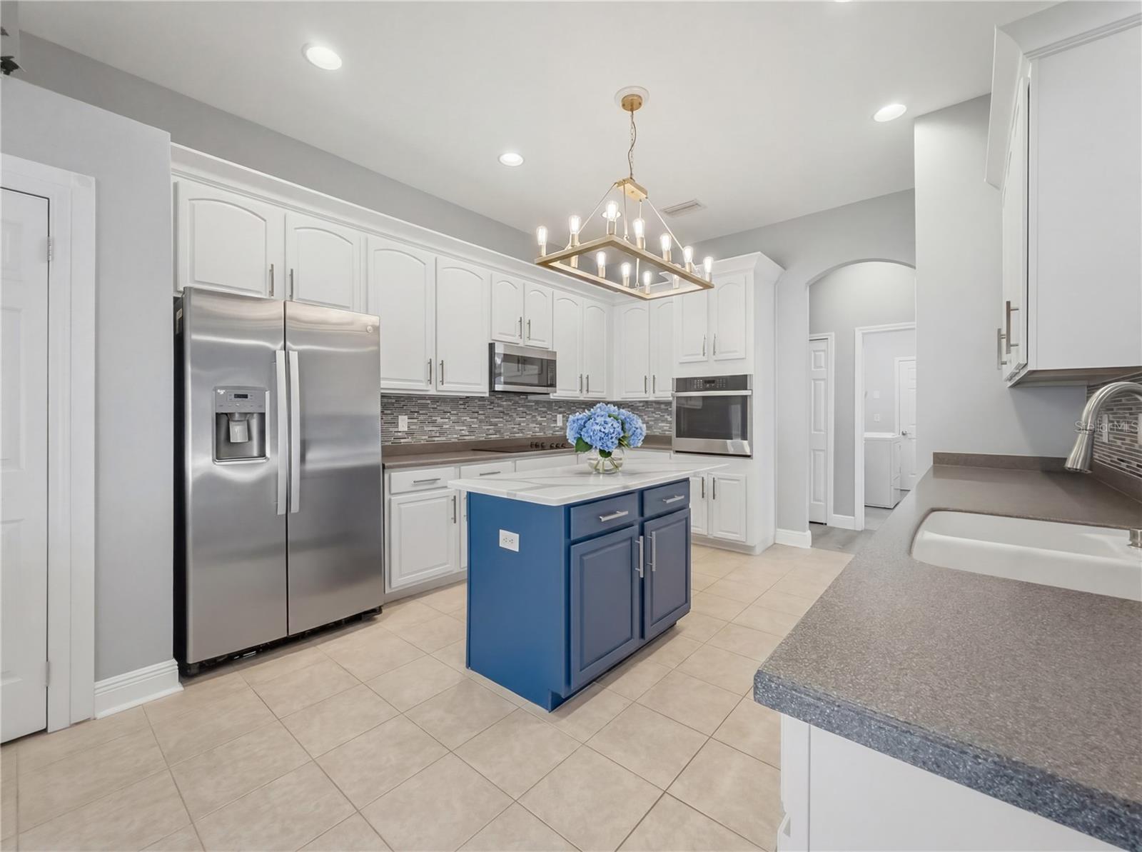 Kitchen view from Family Room - 11530 Oyster Bay Circle, New Port Richey, FL 34654
