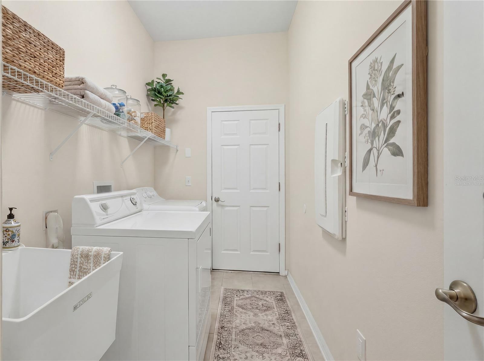 Virtually Staged Laundry Room - 11530 Oyster Bay Circle, New Port Richey, FL 34654