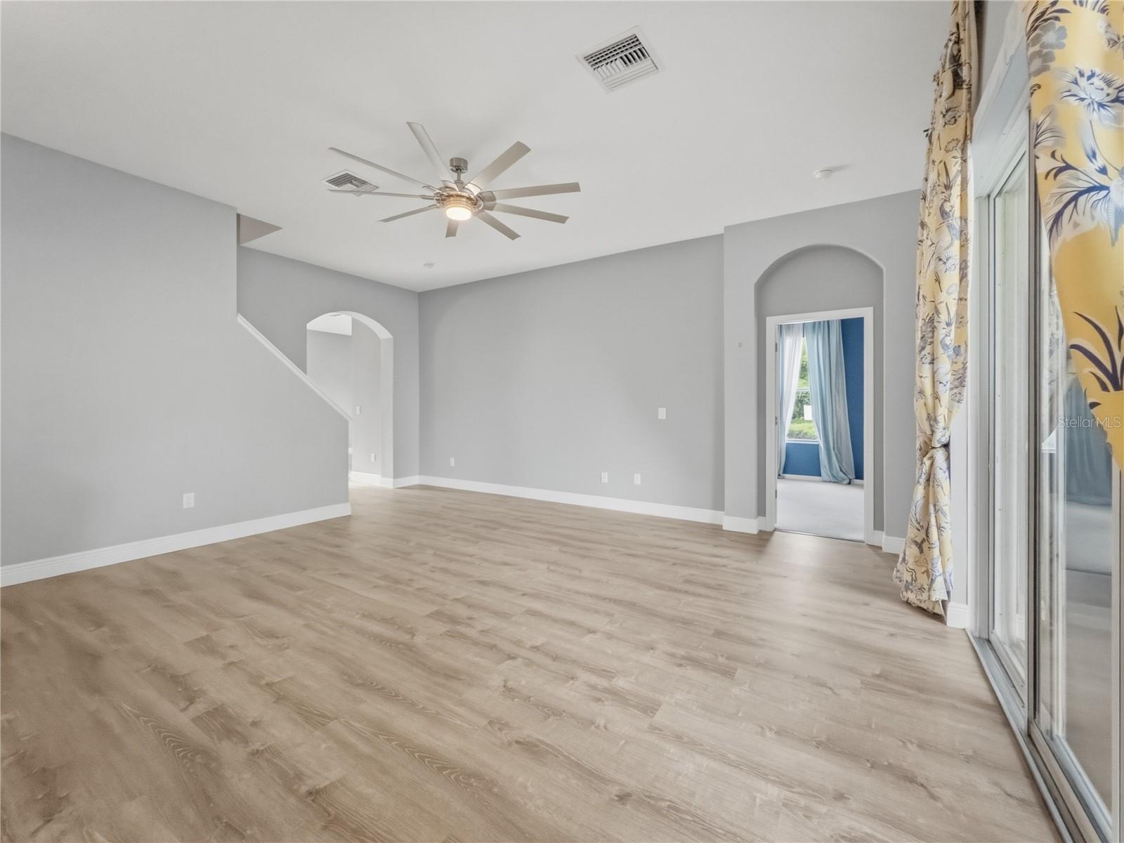 Family Room from Breakfast Nook - 11530 Oyster Bay Circle, New Port Richey, FL 34654