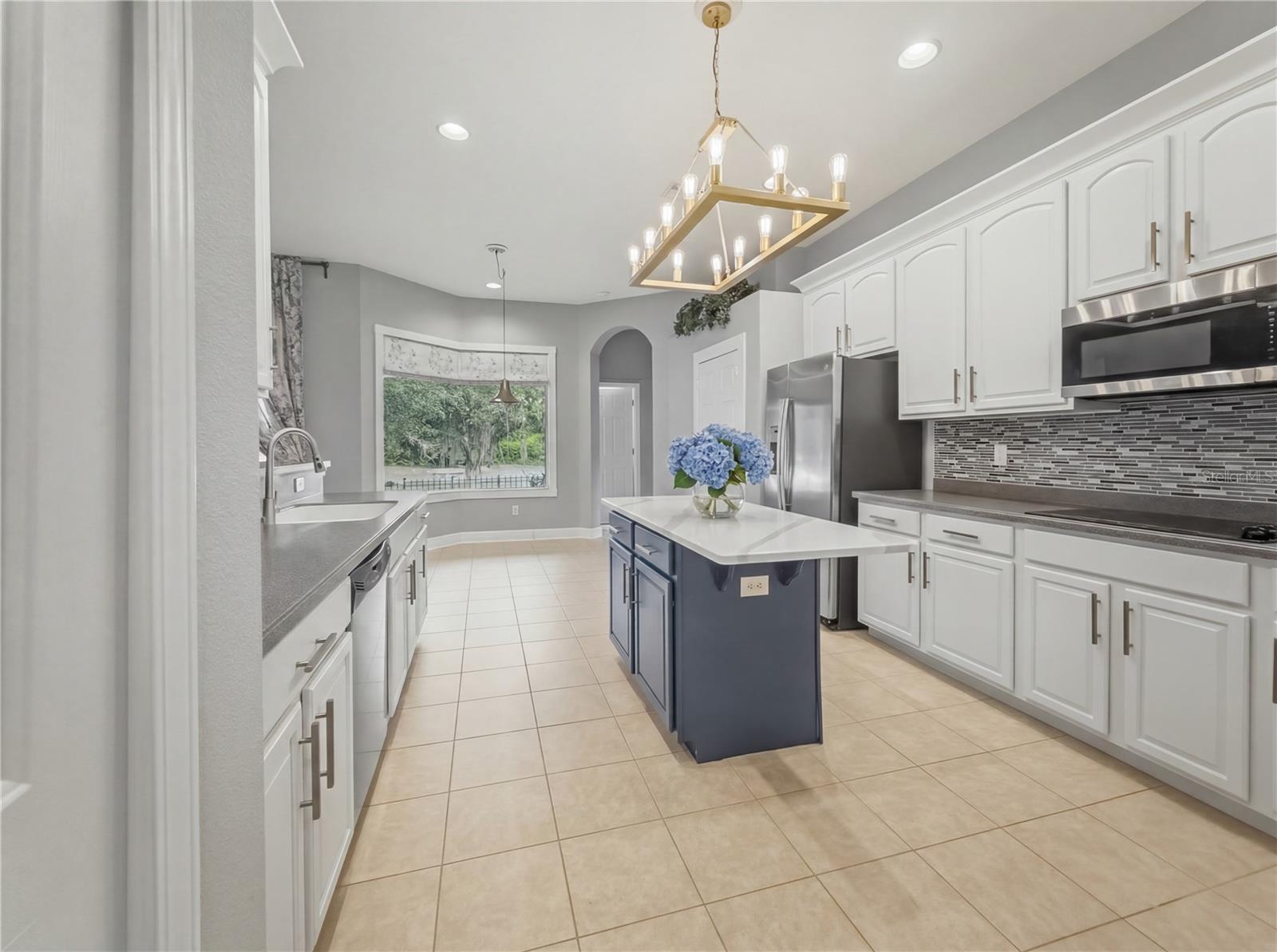 Kitchen View from Dining Room - 11530 Oyster Bay Circle, New Port Richey, FL 34654