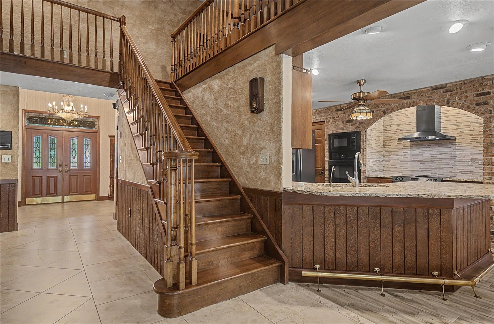 Upstairs to 2 additional bedrooms and open loft