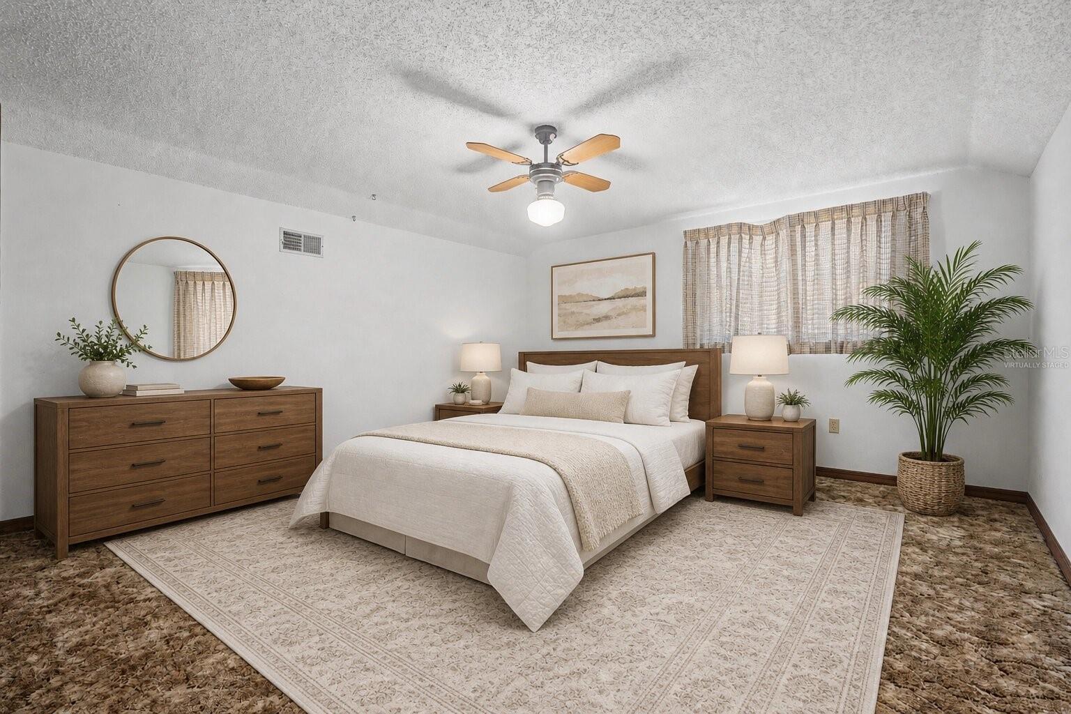 Virtually Staged. Upstairs Bedroom with walk-in closet.