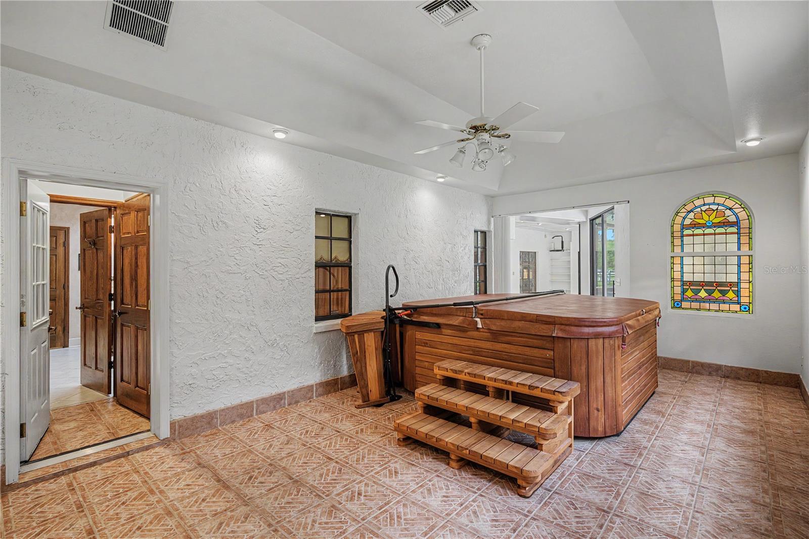 Bonus Hot Tub room off of Enclosed patio & private access through master suite.
