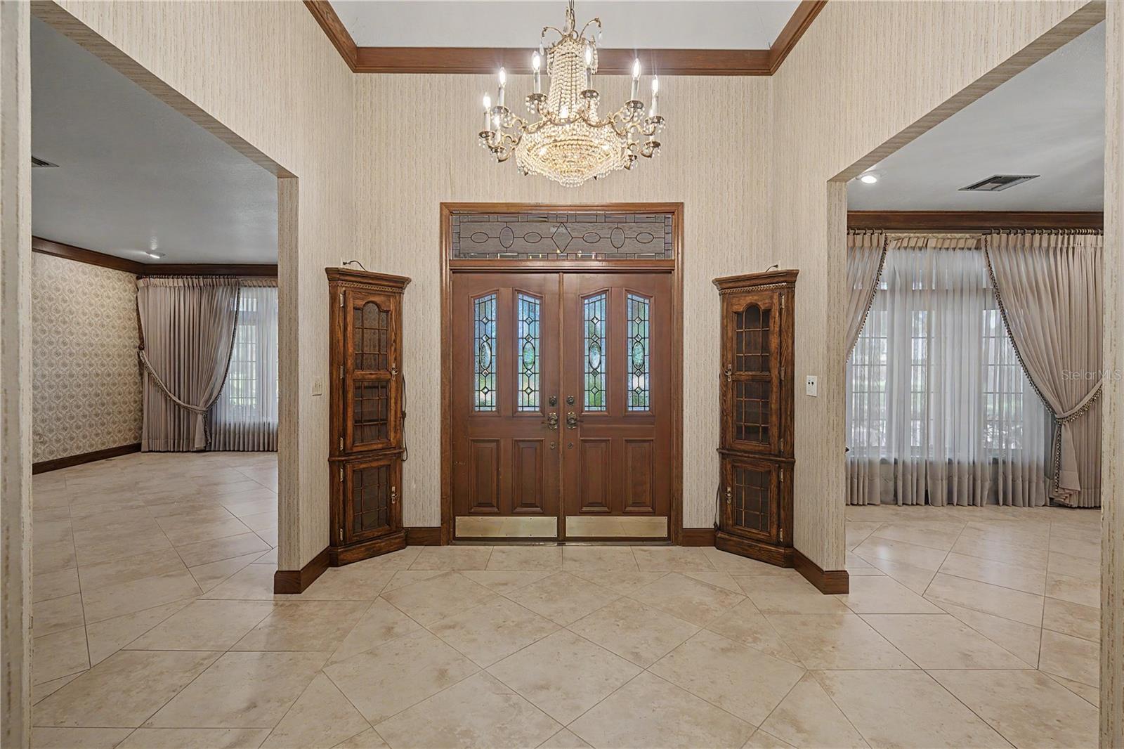 Grand Foyer with split formal Living & Dining