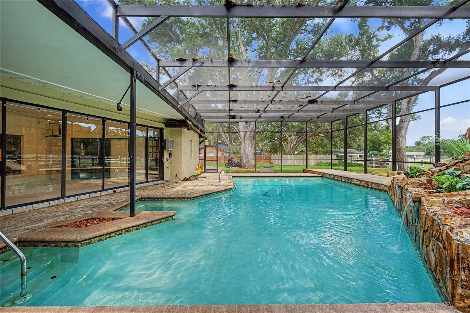 Sparkling Pool with slide, waterfall and screen.