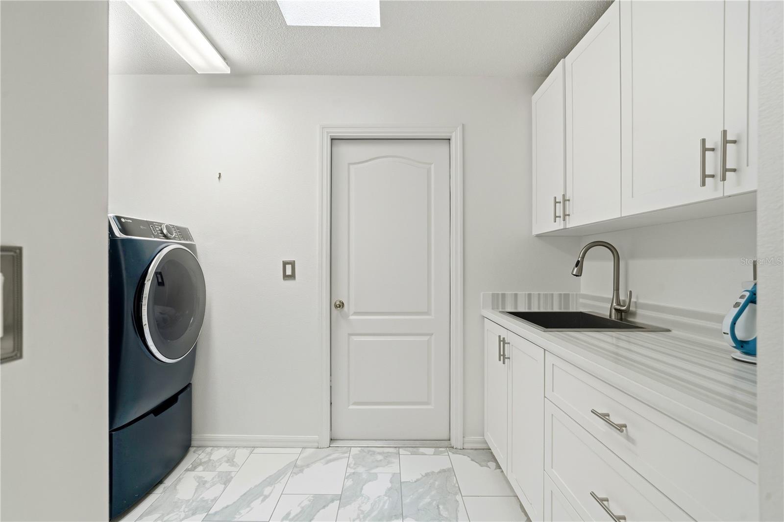 Inside Laundry room/ Washer Dryer