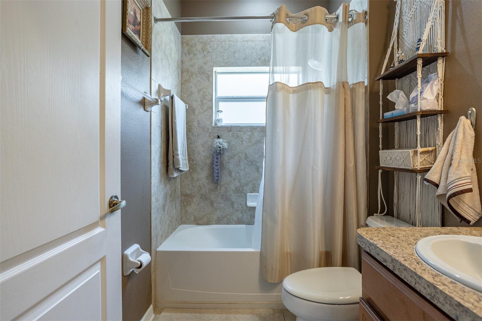 Second bathroom with shower/tub combo