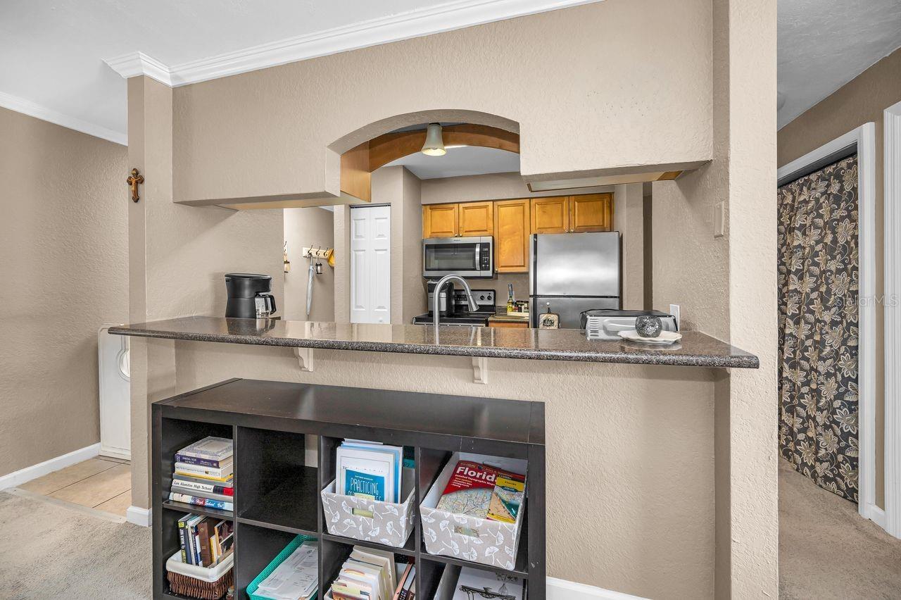 Washer & dryer to right of kitchen in hallway
