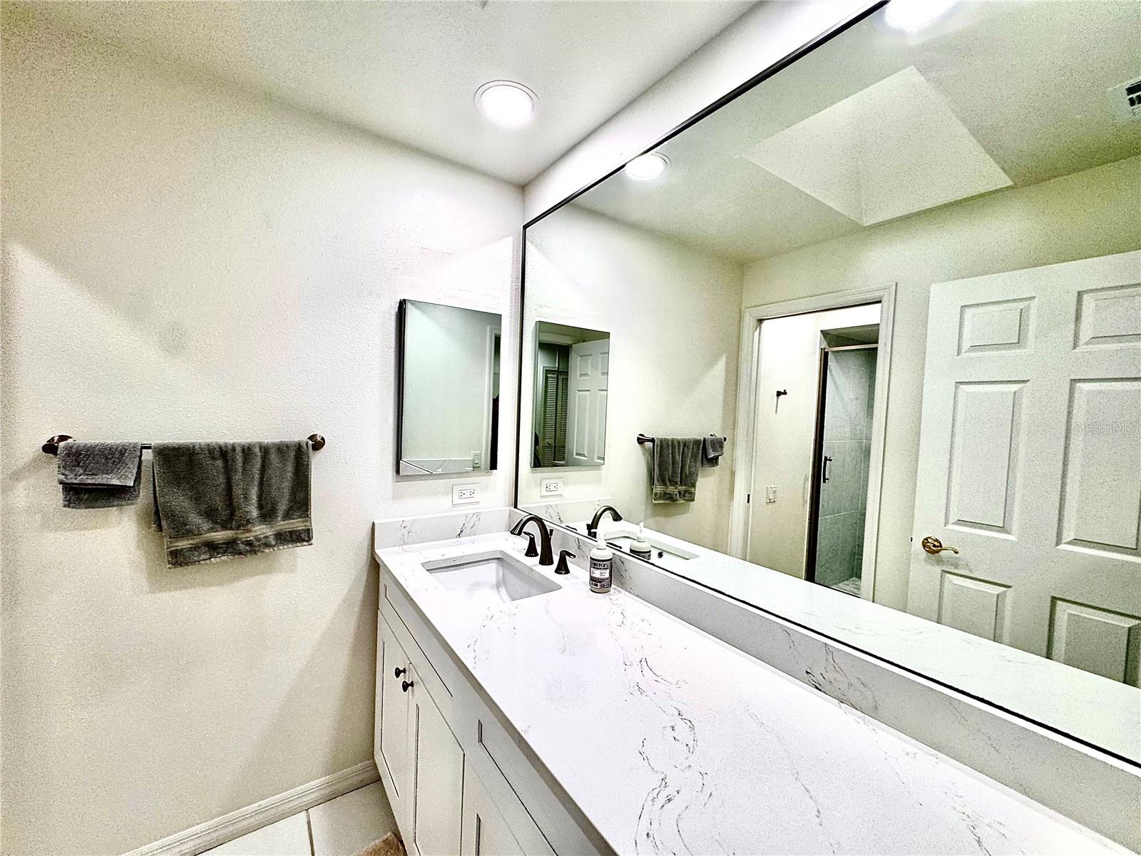 Guest bathroom -newly renovated quartz vanity