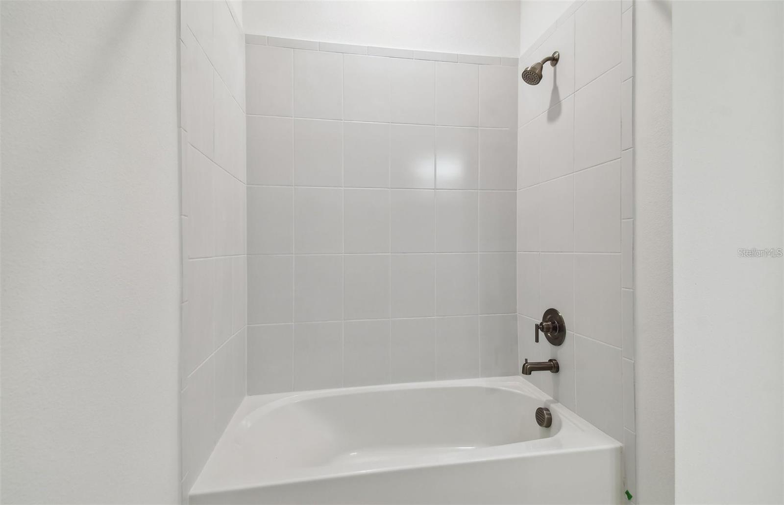 Downstairs hall bathroom tub