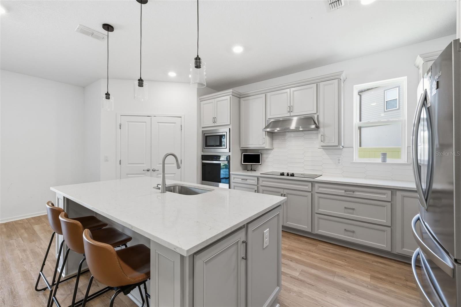 Welcoming breakfast bar and closet pantry