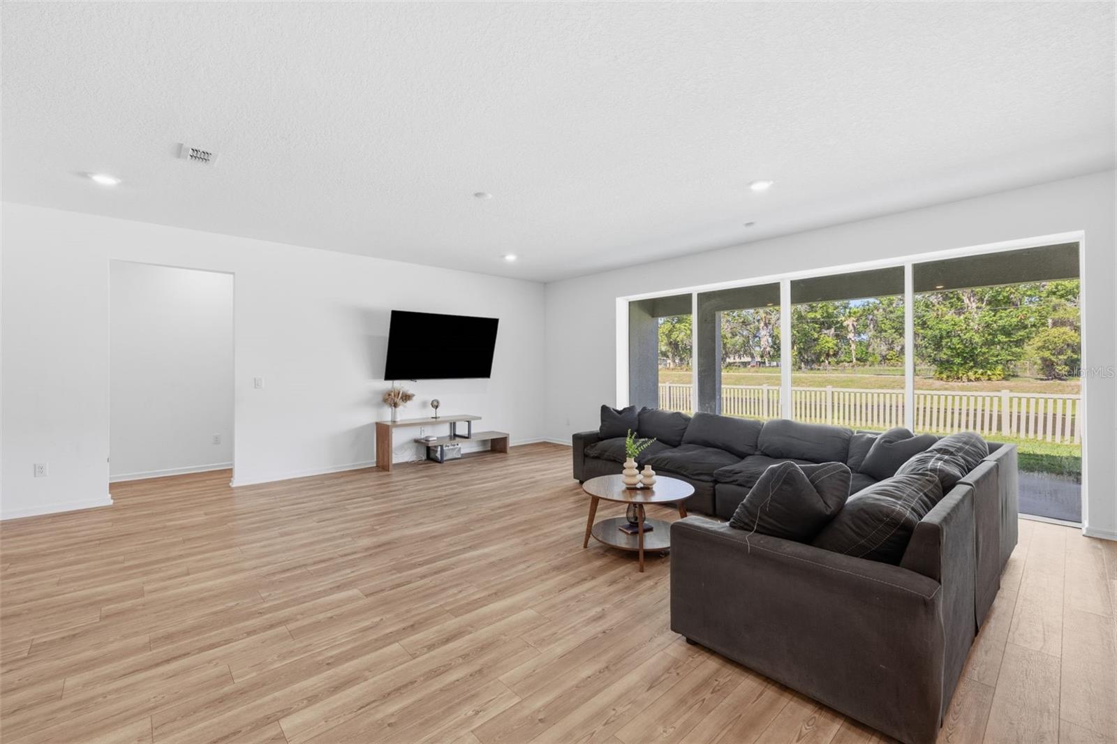 Huge living room with center opening sliding door
