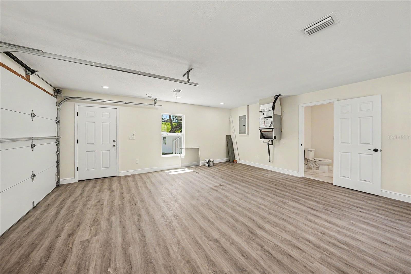 Garage and bathroom view.