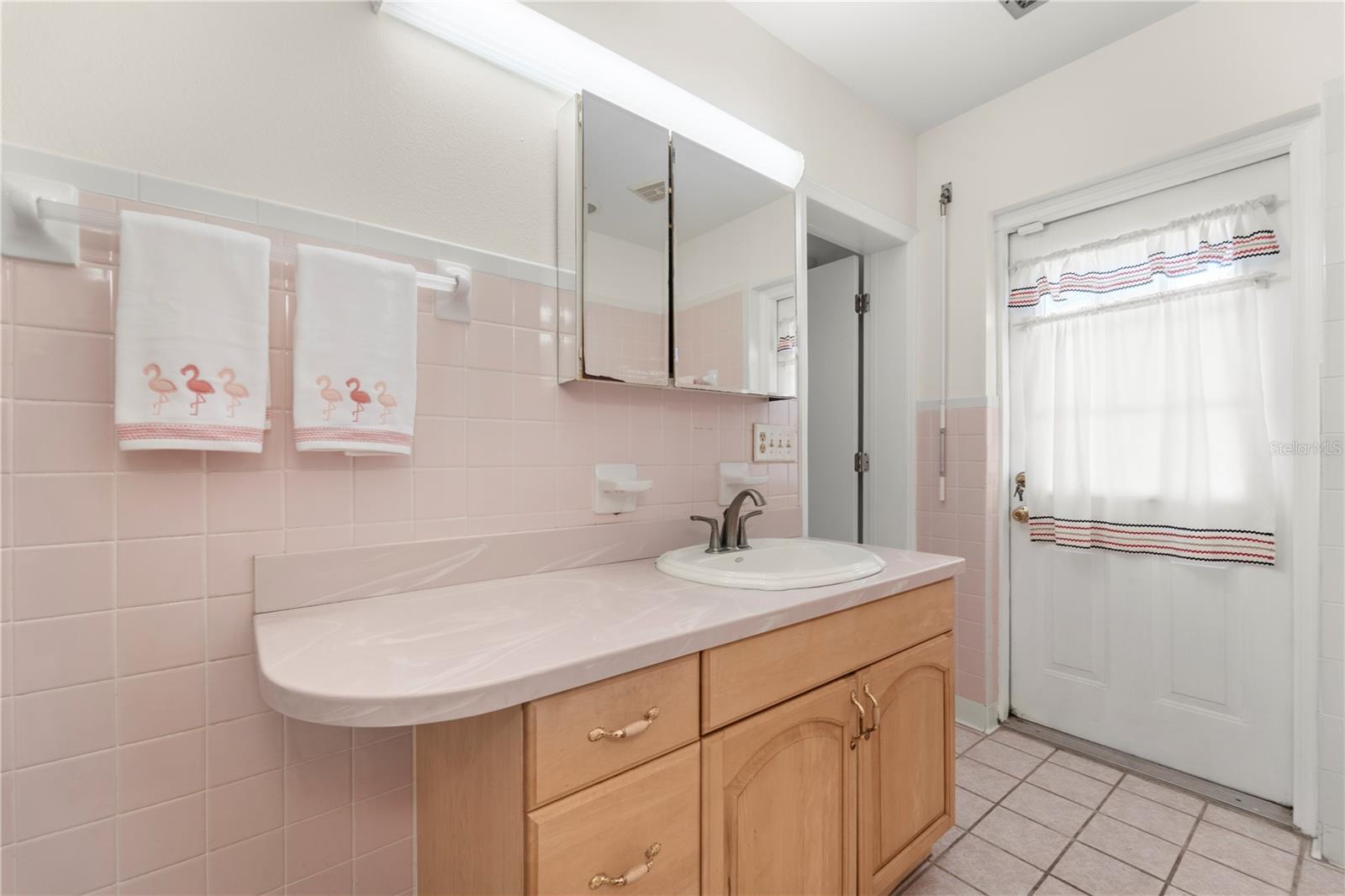 Walk outside bathroom door to private area. Great for a jacuzzi.