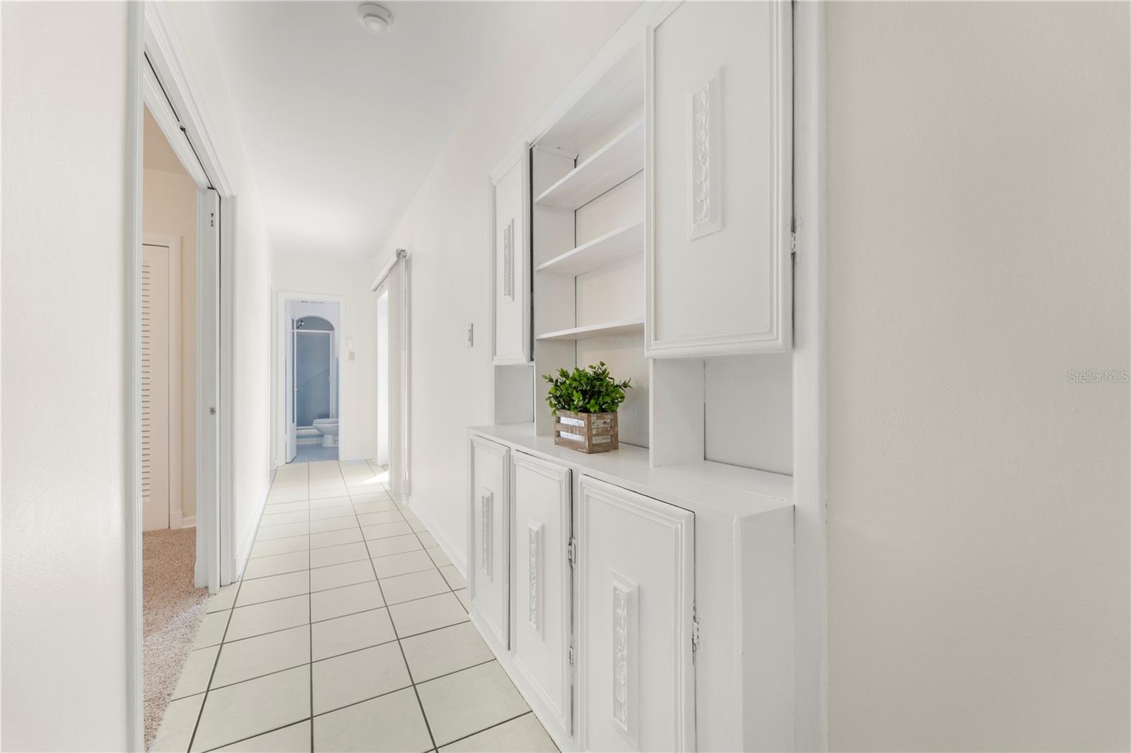 Hallway leading to bedrooms/bathrooms